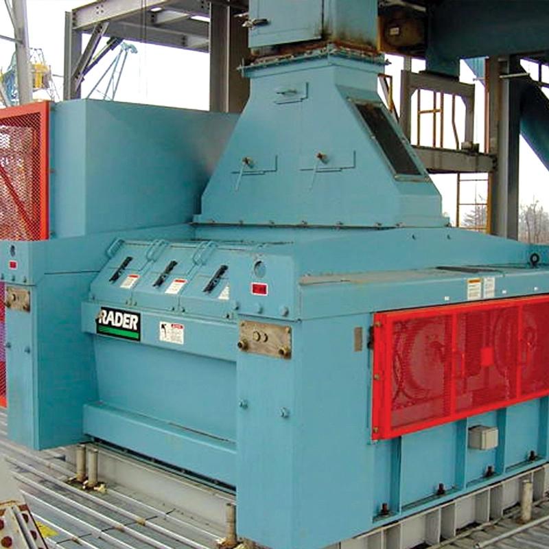 Jeffrey Rader® DynaYield™ II Chip Conditioner installed in an industrial processing facility with enclosed conditioning chamber and integrated material inlet system.