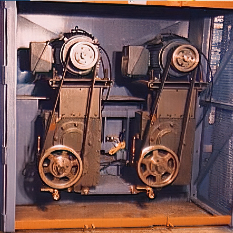 Interior view of the Jeffrey Rader® DynaYield™ II Chip Conditioner showing dual drive assemblies and internal conditioning mechanisms used to process wood chips.