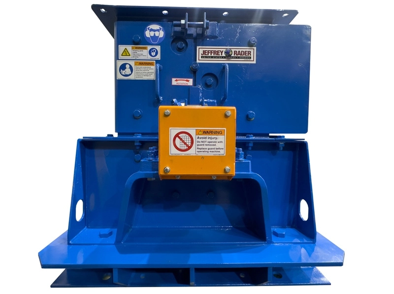 Front view of a Jeffrey Rader® Mini Mill featuring a compact blue steel housing, safety guarding, and material inlet for controlled size reduction applications.