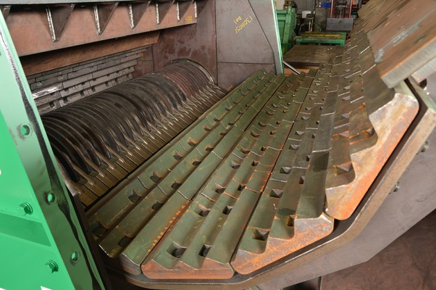 Open access view inside a Pennsylvania Crusher Coalpactor showing the rotor assembly, breaker plates, and replaceable wear liners used for impact coal crushing.